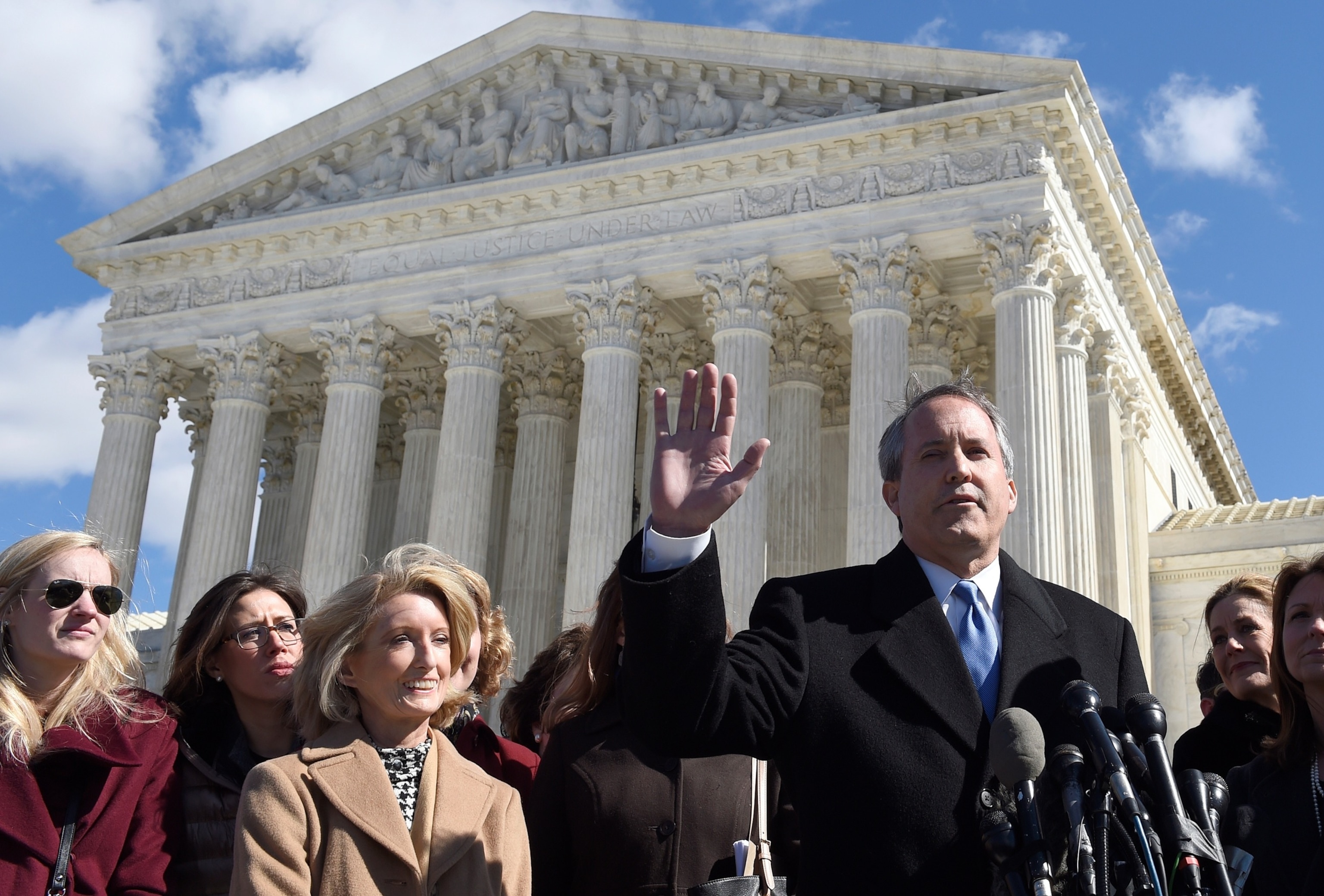 PHOTO: Texas Attorney General Ken Paxton speaks to reporters outside the Supreme Court in Washington, March 2, 2016, after the court heard arguments  over Texas abortion clinic regulations in its biggest abortion case in nearly a quarter-century.