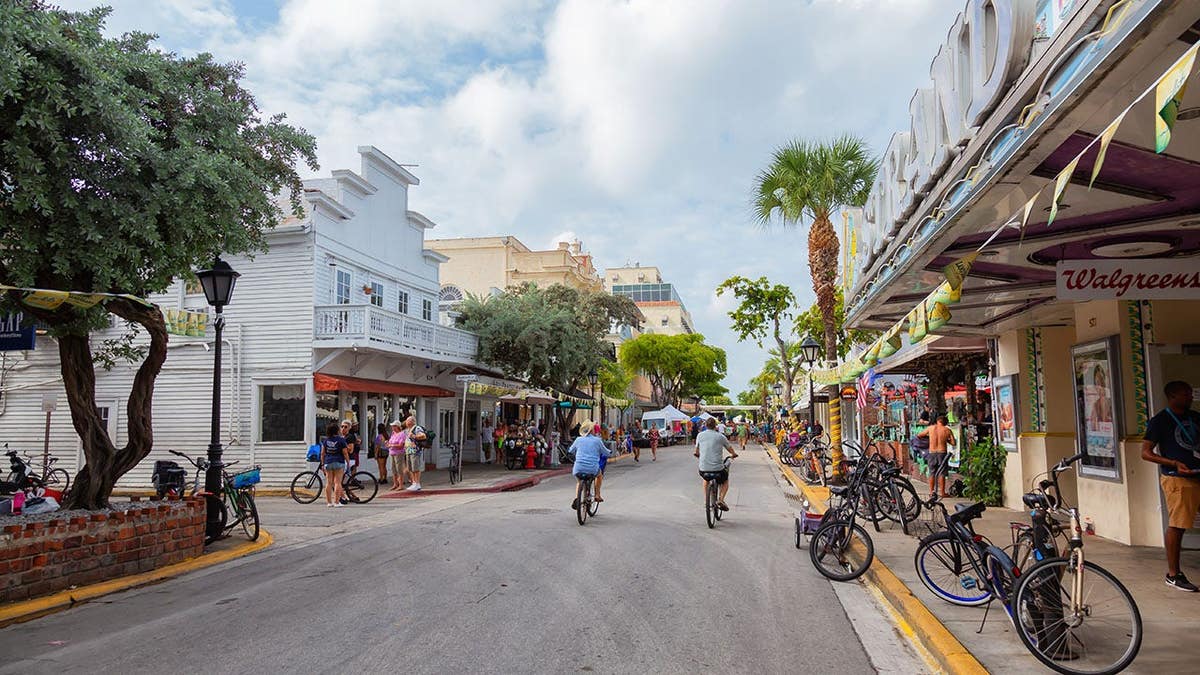 Street view of the Main Strip with bars in downtown Key West Florida