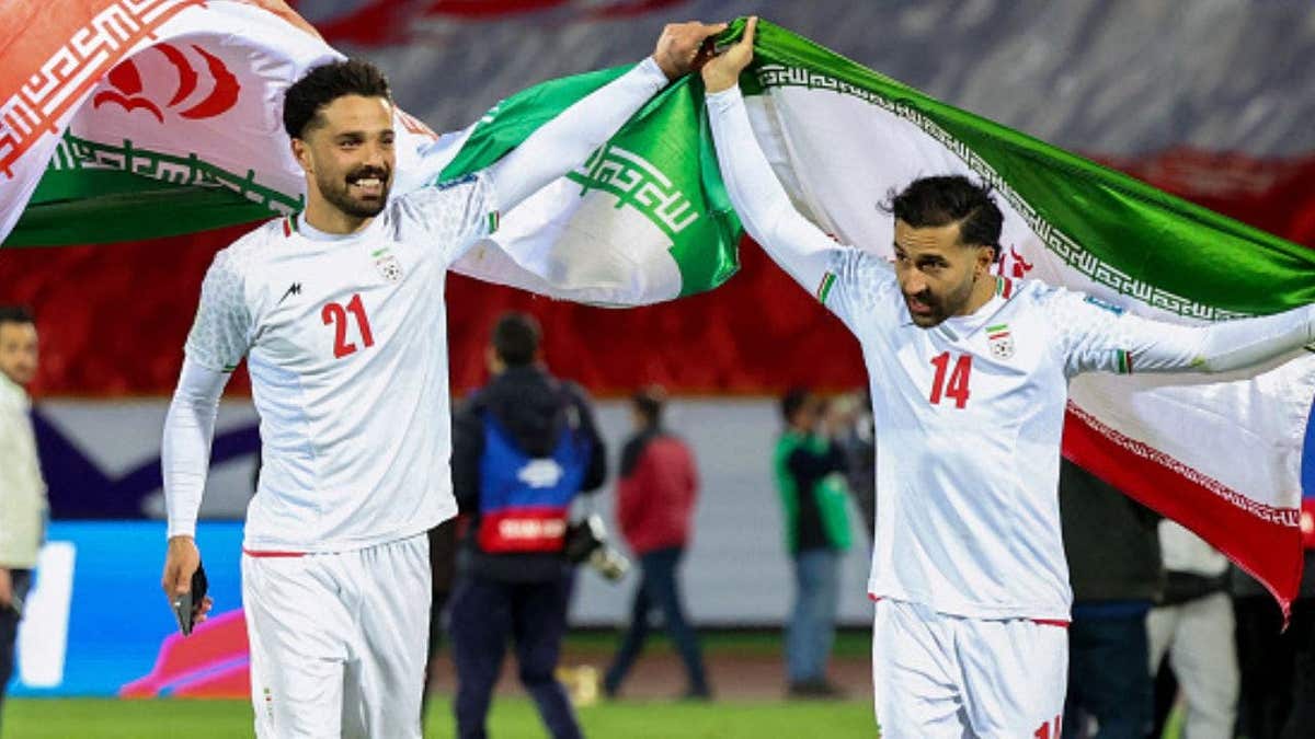 Iranian football players celebrate at the FIFA World Cup 2026 Asia zone qualifiers.