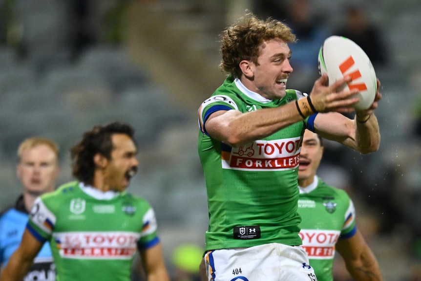 Jed Stuart throws the ball in the air