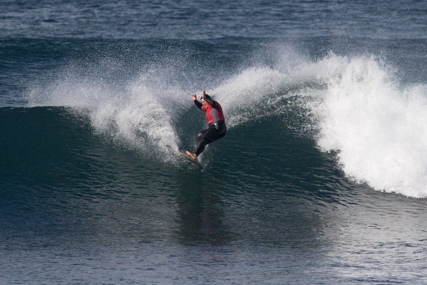Jessi Rebel surfing